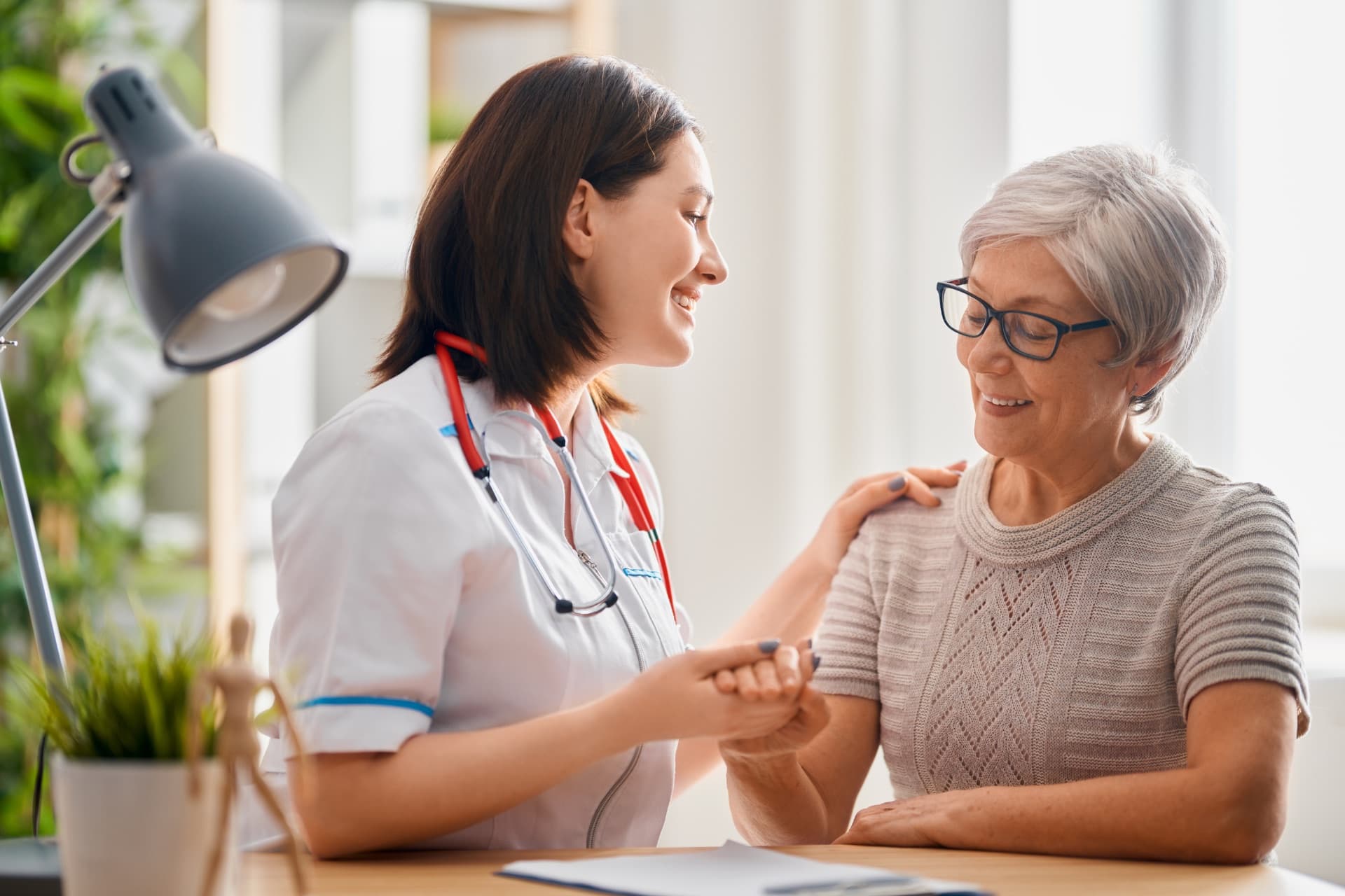 An infusion nurse supporting a patient at Kirkland Specialty Infusion Center